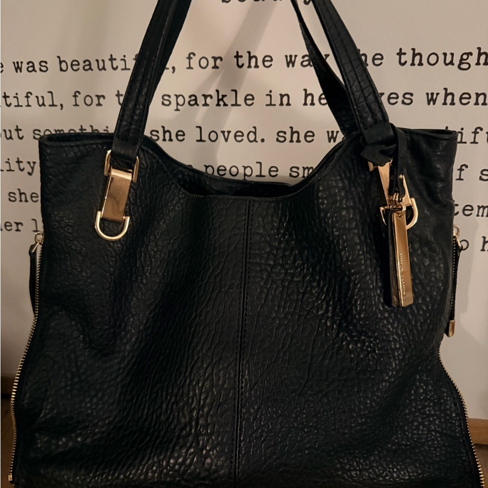 Vince Camuto 100% bubble lamb leather. Rich black. CLEAN interior